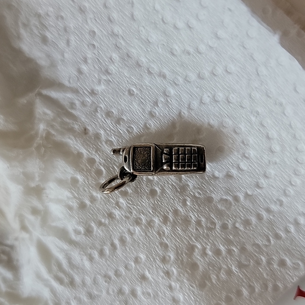 Retired James Avery cell phone charm